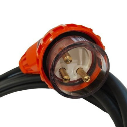 Close-up of an orange electrical plug with black cable on a white background