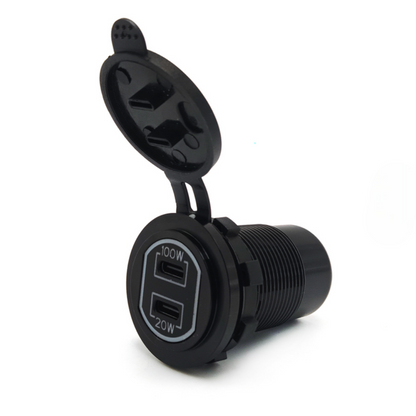 Angled view of the Etronx 120W car charger socket with hinged dust cap, showing the 100W and 20W USB-C port labels on the front face.